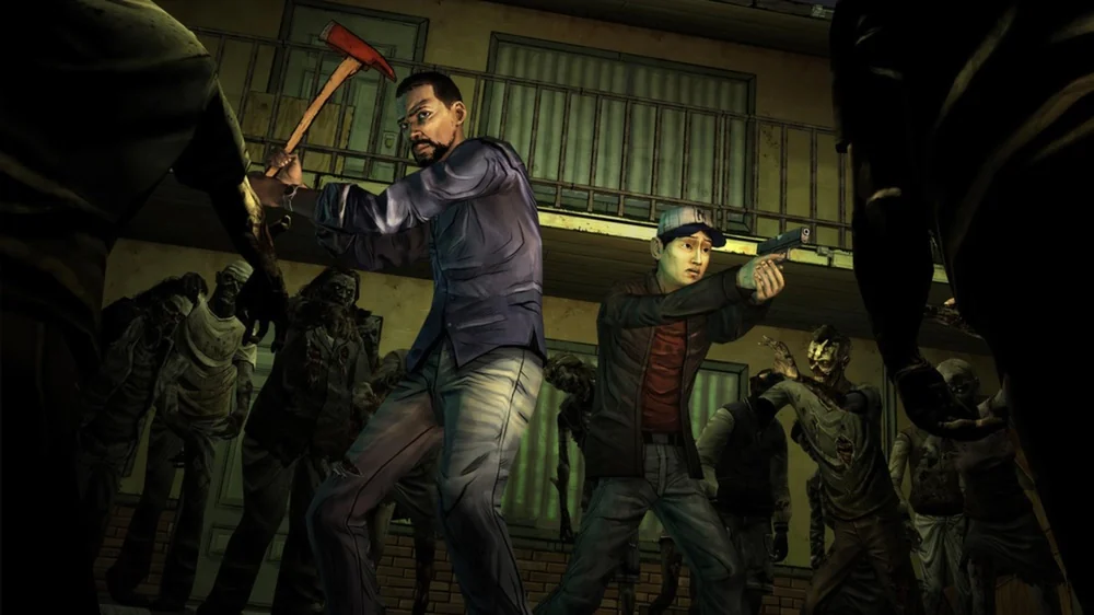 Deux personnes sont entourées de zombies.